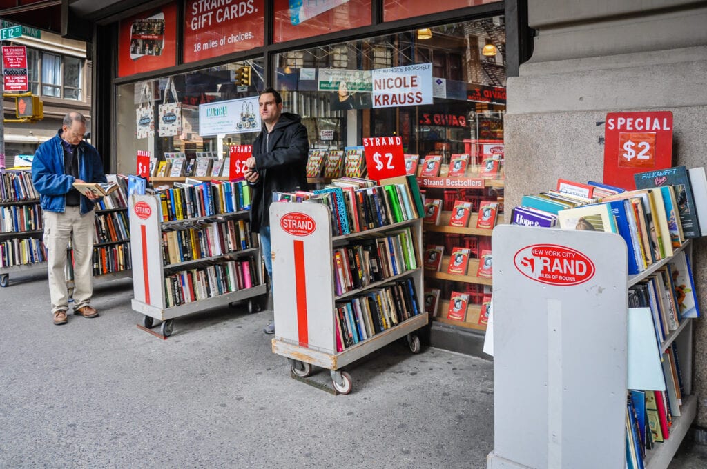 Book shelves outdoors at The Strand Bookstore.