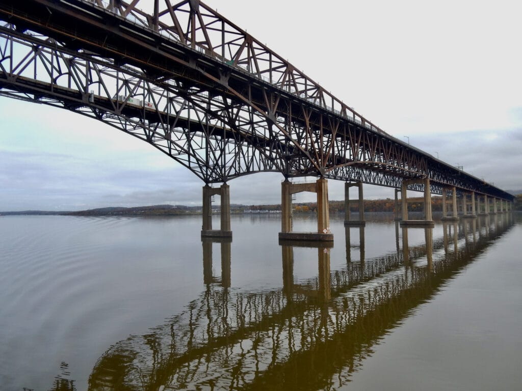 Railroad Bridge reflected in Hudson River water