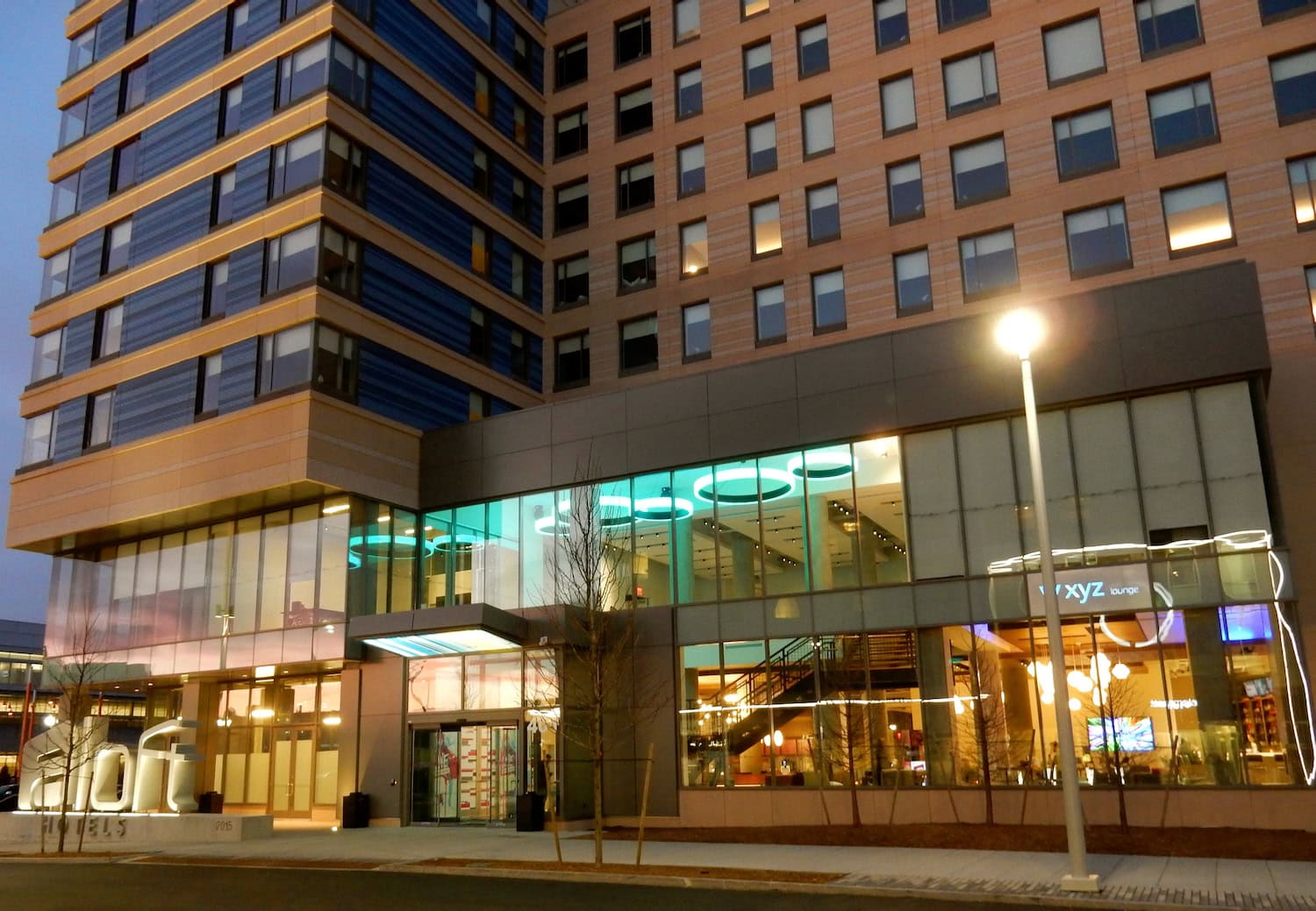 Aloft Hotel Boston Seaport exterior at night