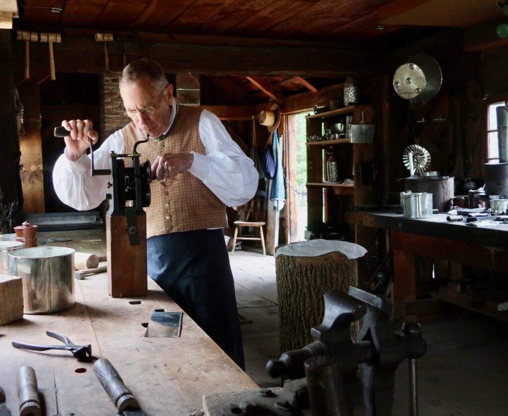 Tinner at work in Old Sturbridge Village MA